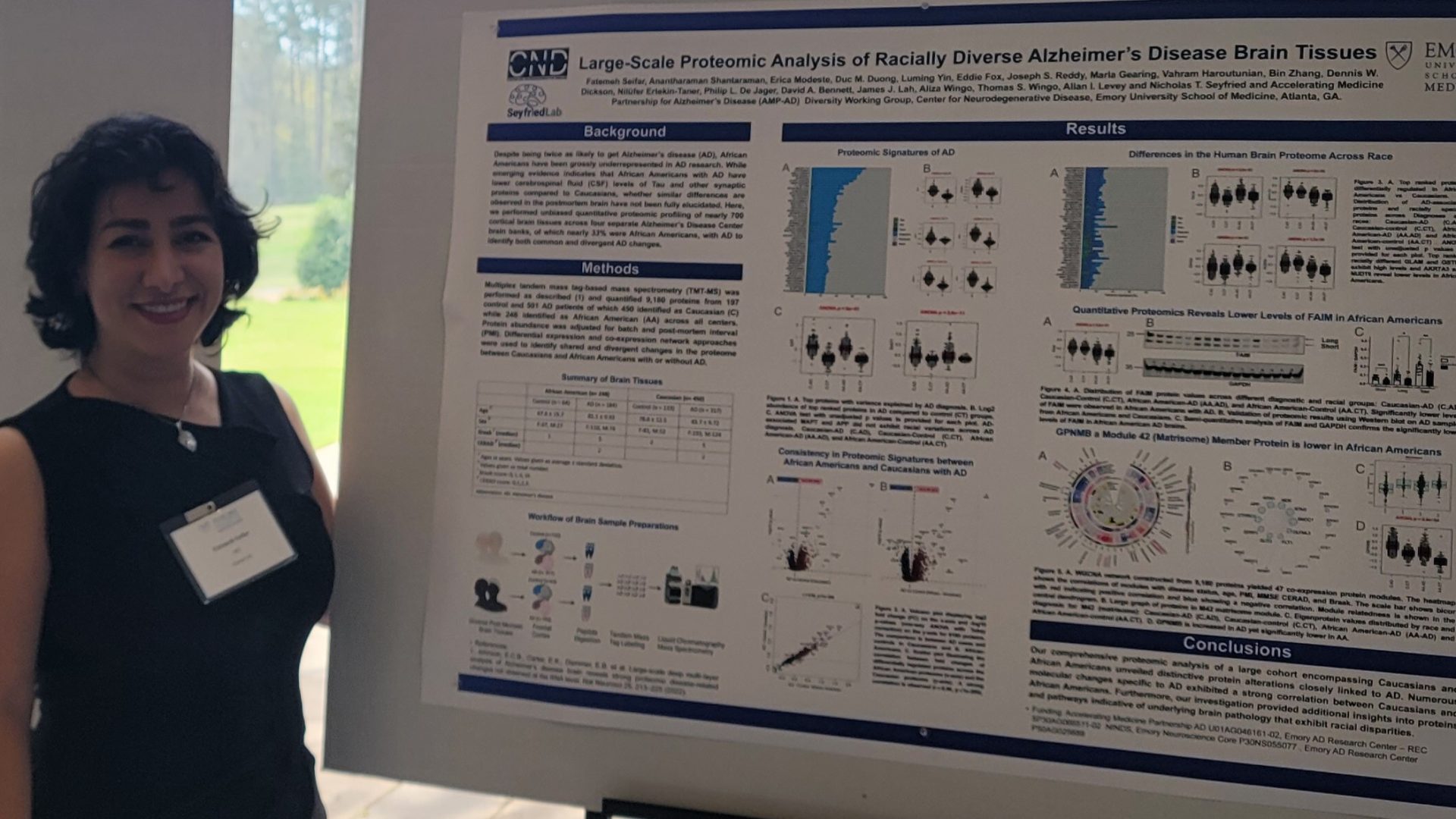 Fatemeh Seifar with her winning poster at Georgia Neurological Society meeting.